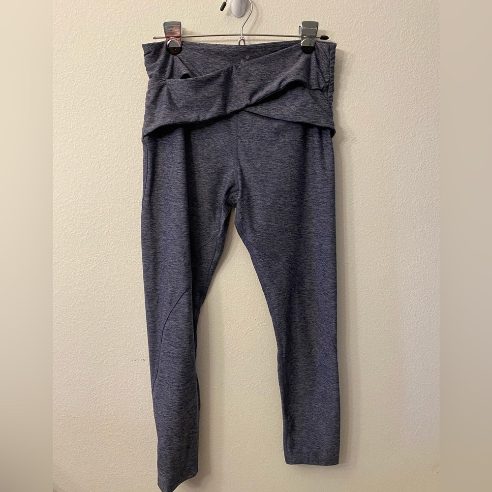 Apana leggings with crisscross front detail. Size medium. Heather blue color.